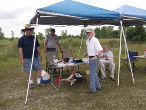Modelers around the scoring table.