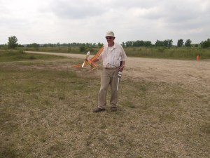 Jim Ferwerda with small cabin model